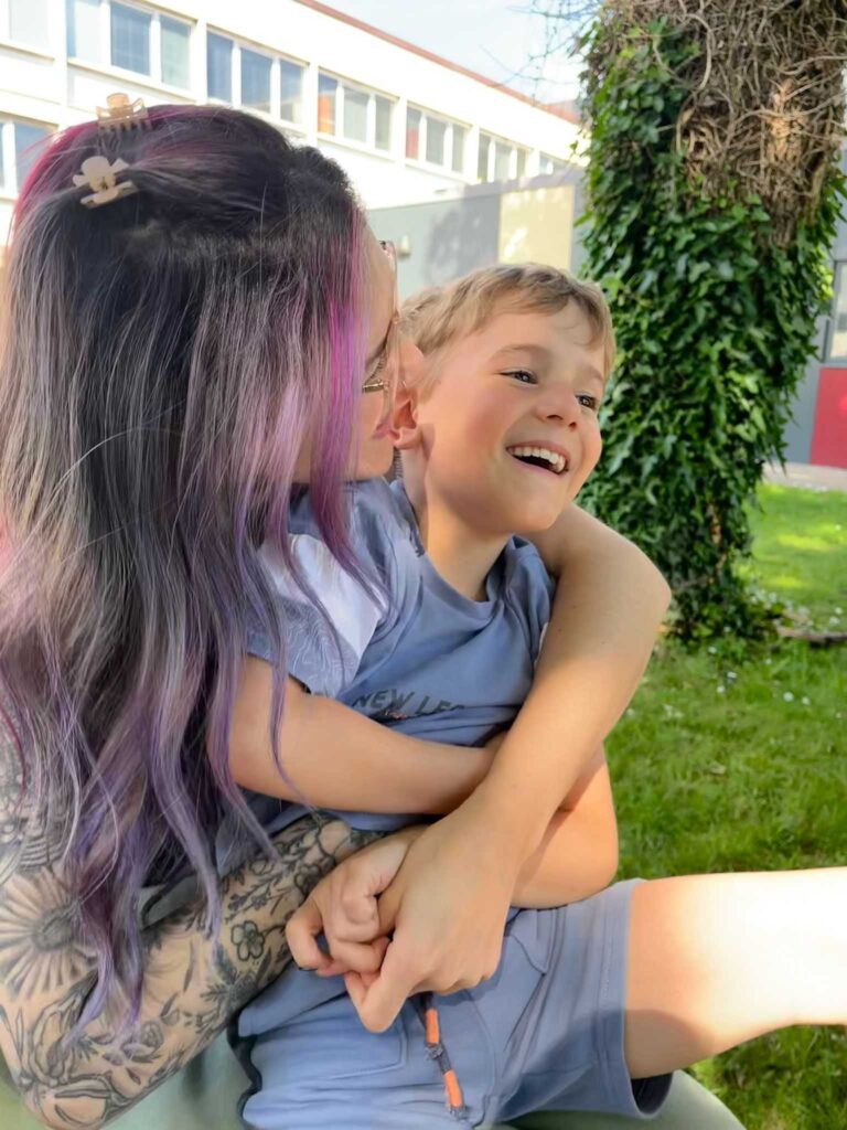 Kirsty and a smiling Oliver before treatment