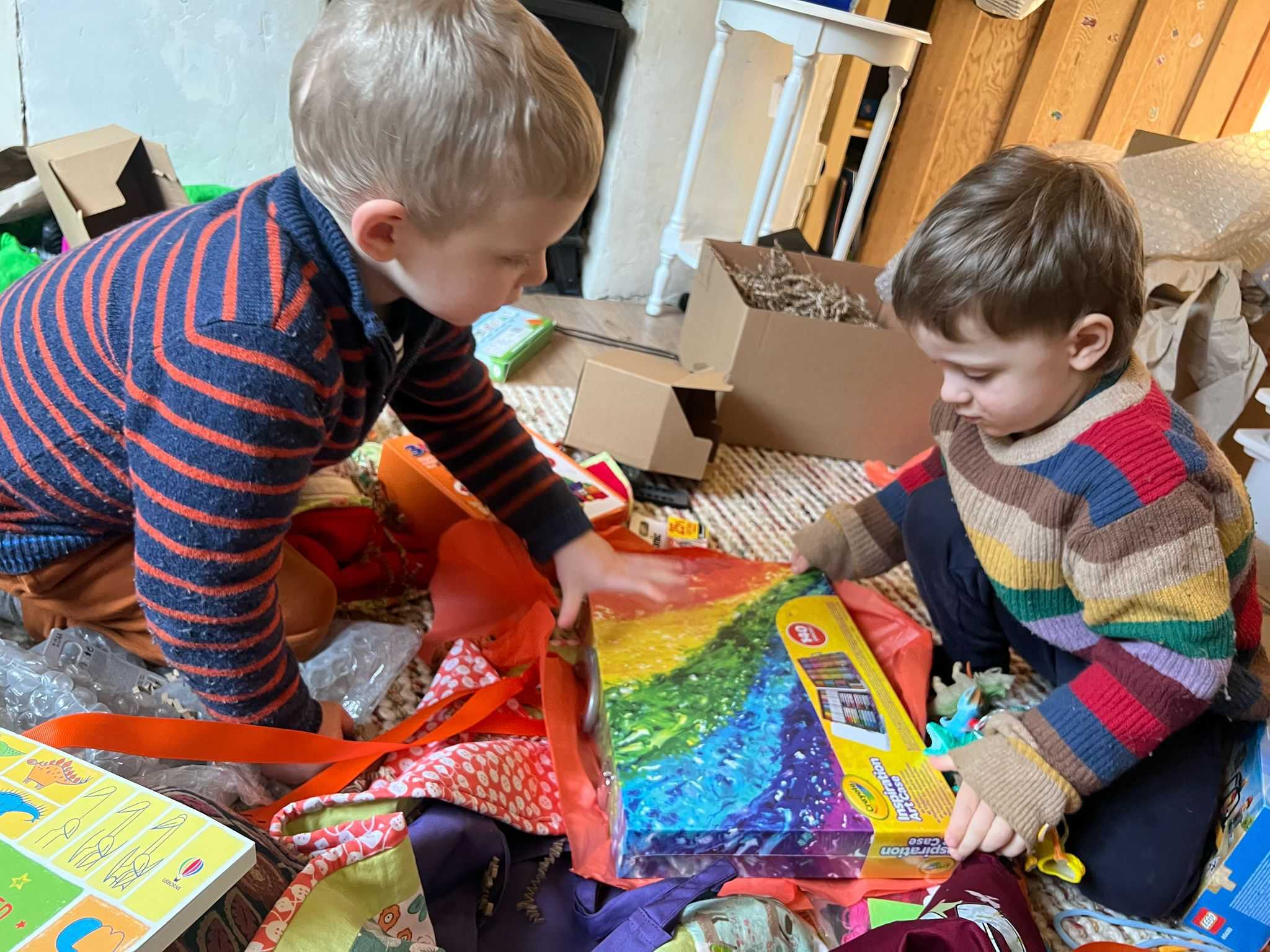 Dartmoor Family Challenge 4 Booster box being opened by two brothers